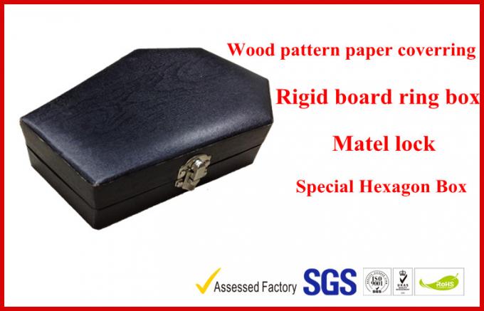 jewellery showing gift packaging boxes , black rigid paper rings